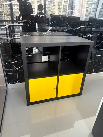 Compact Black Storage Cabinet with 2 Yellow Doors
