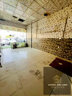 Commercial Shop for Annual Rent in Al Rawda 2 | Main Road | Business Opportunity | Negotiable