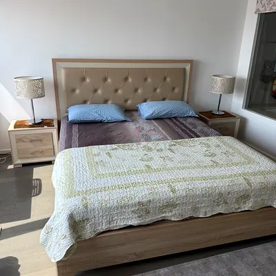 Modern Bedroom Set with Bed, Nightstands, Mirror with chest of Drawers, and Mattress.