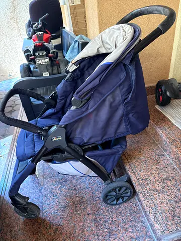 Used Chico navy baby stroller - lightweight standard stroller