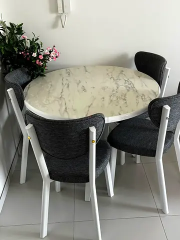 Compact round marble-effect dining table with 4 chairs - good condition