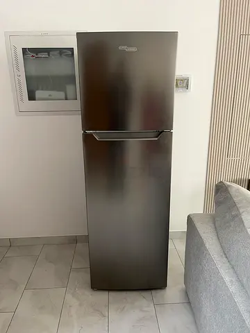Slim single-door refrigerator in good condition