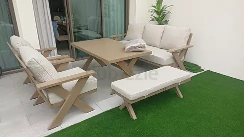 Outdoor 4-piece patio seating set with coffee table and bench - beige