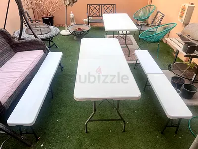 Foldable plastic table and 2x benches set — good condition, indoor or outdoor use