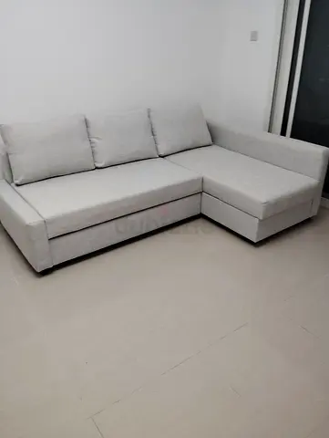 Light grey L-shaped 3-seater sofa with chaise (good condition)