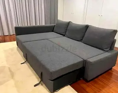 Gray L-shaped Sofa Bed with Pull-out Storage - Good Condition