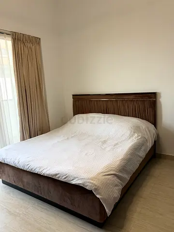 Queen bed frame with headboard - brown fabric