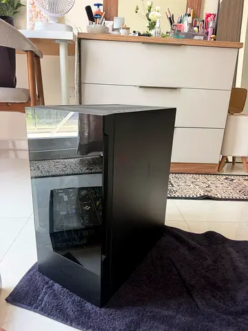 Sleek Black ATX PC Case with Tempered Glass Side Panel