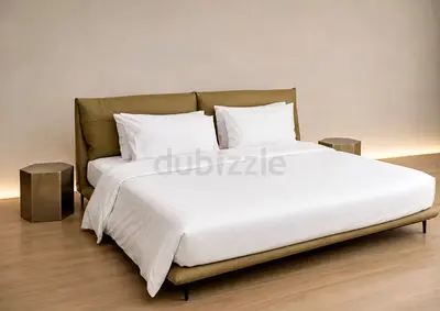 Modern low-profile queen bed with upholstered headboard — beige