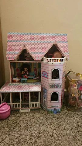 Large Wooden Dollhouse with Furniture and Dolls along with doll wardrobe display case