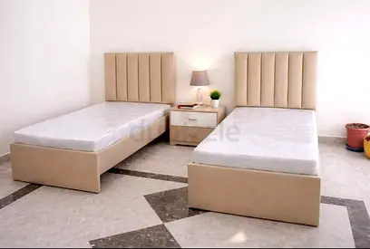 Pair of beige single beds with headboards & mattress - good condition
