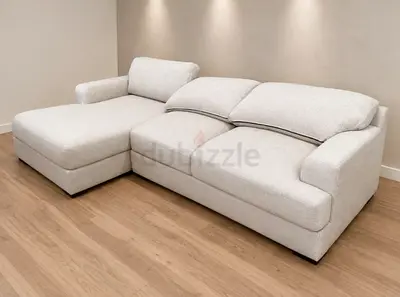 Light beige L-shaped fabric sofa with chaise - modern, comfortable