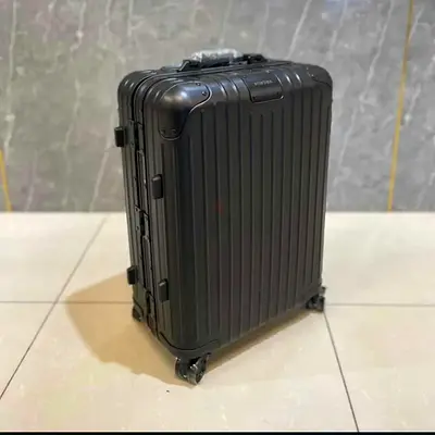 Black RIMOWA SUITCASE