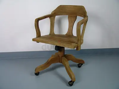 Solid wooden swivel office chair with armrests — vintage style