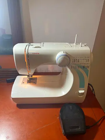 Toyota compact sewing machine with foot pedal - good working condition