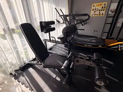 Inspire Fitness Adjustable Bench with Leg Extension & Leg Curl Attachment