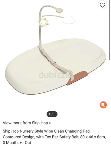 Skip Hop wipe-clean contoured changing pad with toy bar & safety belt