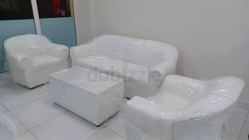 White 3-seater sofa with 2 armchairs and coffee table - good condition