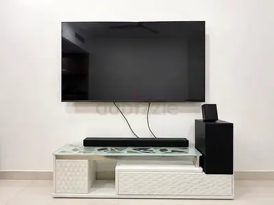 LG 65" LED TV with soundbar and subwoofer - Excellent condition