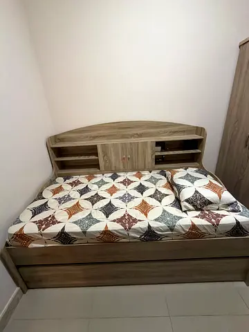 Brand new Queen wooden bunk bed frame with storage headboard.