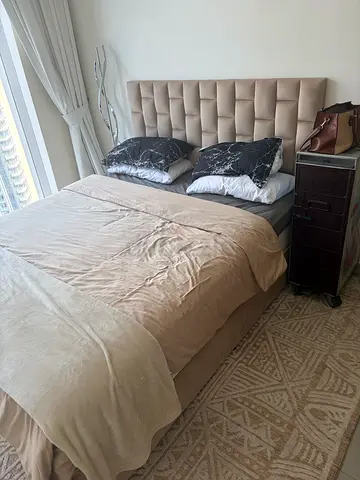 Queen upholstered bed frame with padded headboard — beige and mattress included luxury mattress