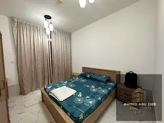Largest furnished 2BR in Al Waha Towers Ajman. 2 masters, maid, 3 balconies, gym, pool & parking. 65