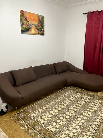Brown big fabric sofa in good condition