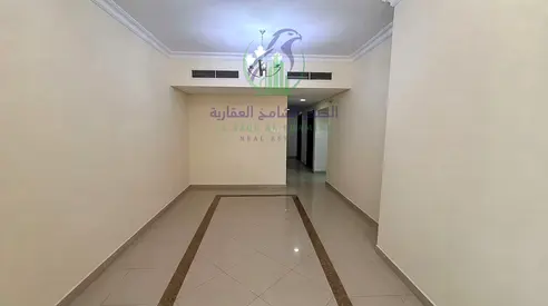 شقة 3 غرف وصالة للإيجار في التعاون | إطلالة بحرية | غرفة خادمة | موقف مجاني | 58,000 درهم