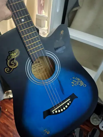 Blue acoustic guitar - used, good condition