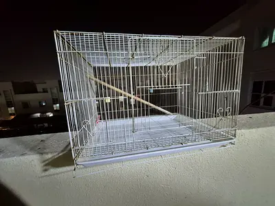 Large white metal bird cage with perches - good condition