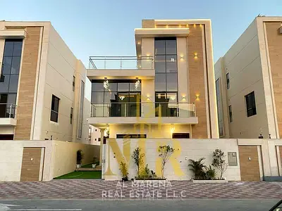 Luxury villa for sale in Al Zahia – Ajman | 6 master bedrooms | Separate majlis | Two floors and a roof | Includes registration and ownership fees