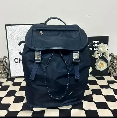 Blue nylon Rimowa flap backpack
