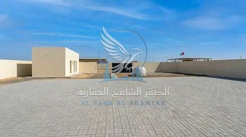10,000 Sq Ft Yard for Rent in Al Sajaa with 30 kW Power, Interlock and Rooms – AED 140,000