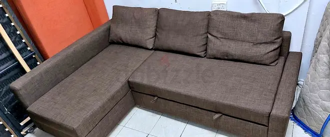 Brown L-shaped Fabric Sofa bed with Storage - Good Condition