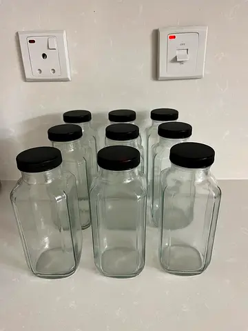 Set of 9 Glass Storage Bottles with Black Lids
