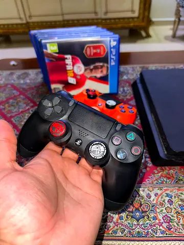 PS4 Slim with 2 DualShock Controllers and 6 PS4 Games - Excellent Condition