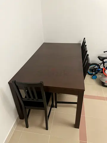 Dark brown wooden dining table with 4 chairs - good condition