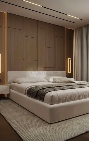 Modern upholstered platform bed with low profile and headboard and wall cleding