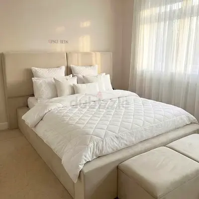 Cream upholstered king-size bed frame with headboard customise bed