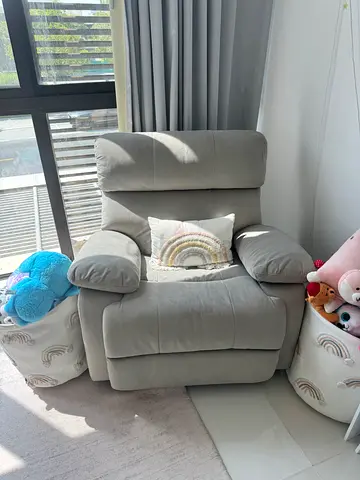 Light grey single recliner armchair in excellent condition
