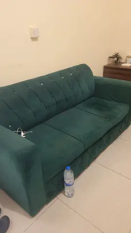 Green 3-seater velvet sofa in good condition