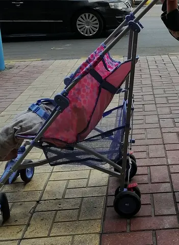 Lightweight pink umbrella stroller - good condition and also have another one green color