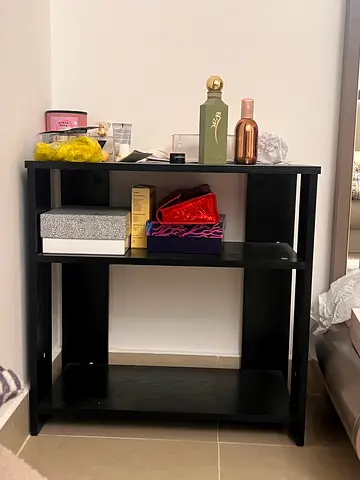 Compact black shelf in new like condition