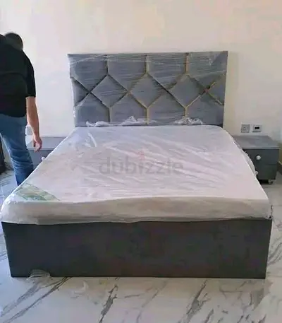 Selling new Bed with mattresses with two side tables