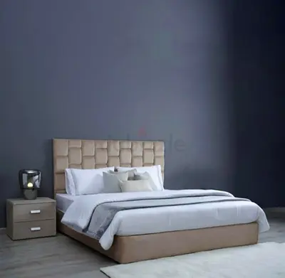 Queen size upholstered bed with padded headboard and storage base - beige