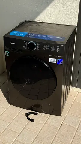 Midea 10kg Front Load Washing Machine - Black, Great Condition. Need to change control board.