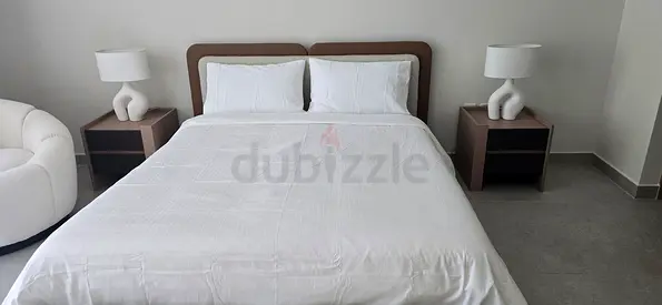 Queen bed with matching bedside tables - modern frame in mint condition, never used