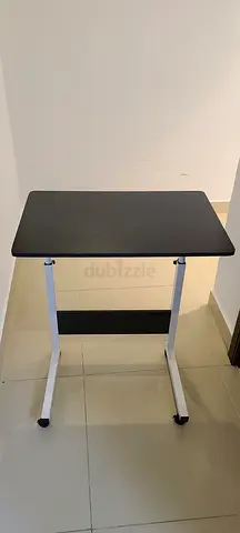 Compact black study/computer table with metal legs