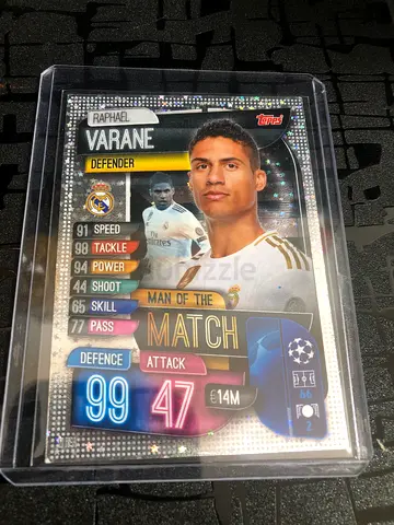 Topps Match Attax Varane UEFA Champions League collectible card in protective case