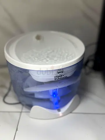 automatic cat litter box, water fountain , food dispenser and cat teee